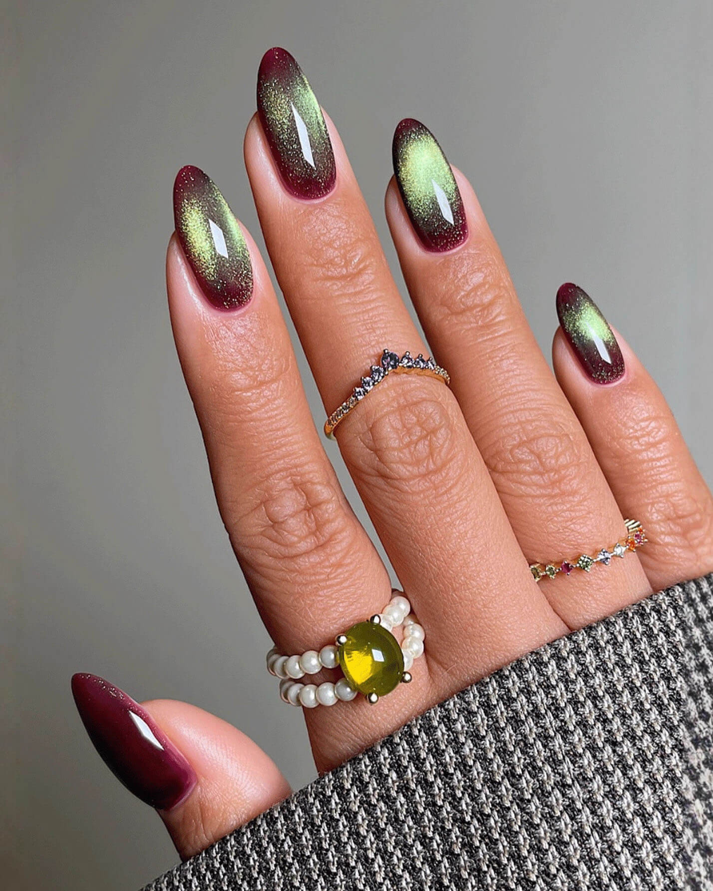 Green Cat Eye Medium Length Almond Nails